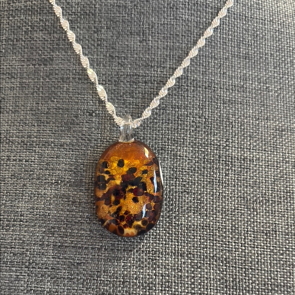 Black Gold Glass Oval Pendantt Silver Tone Twised Necklace.